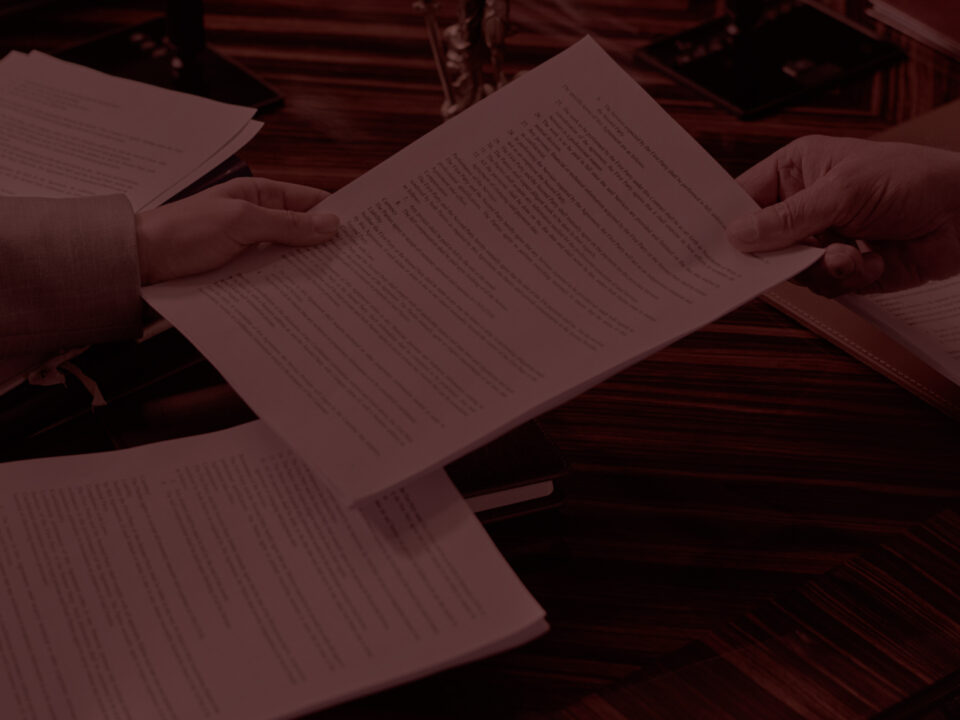 Lawyer handing over paperwork